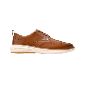Cole Haan Men's Grand Hurrion Wingtip Oxford, Flowerflex Foam, Brtitish Tan/Ivory, Medium